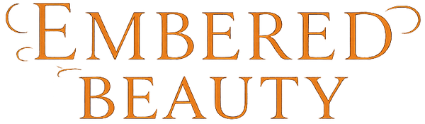 Logo of 'Embered Beauty' with a stylized phoenix bird on a white background